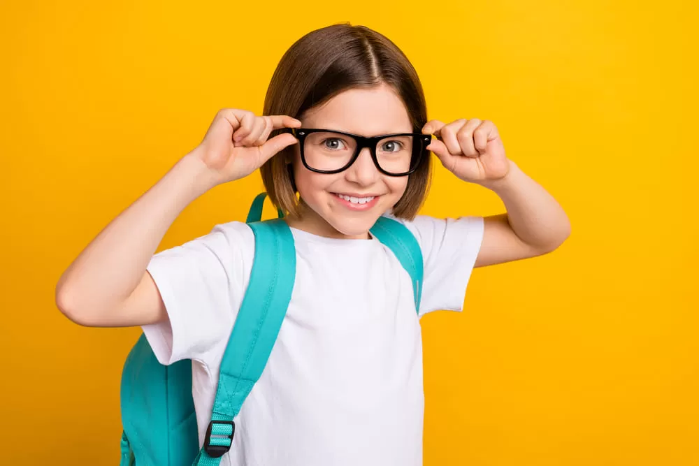 beautiful-little-clever-girl-portrait-round-shaped-glasses-with-books-selective-soft-focus.jpg